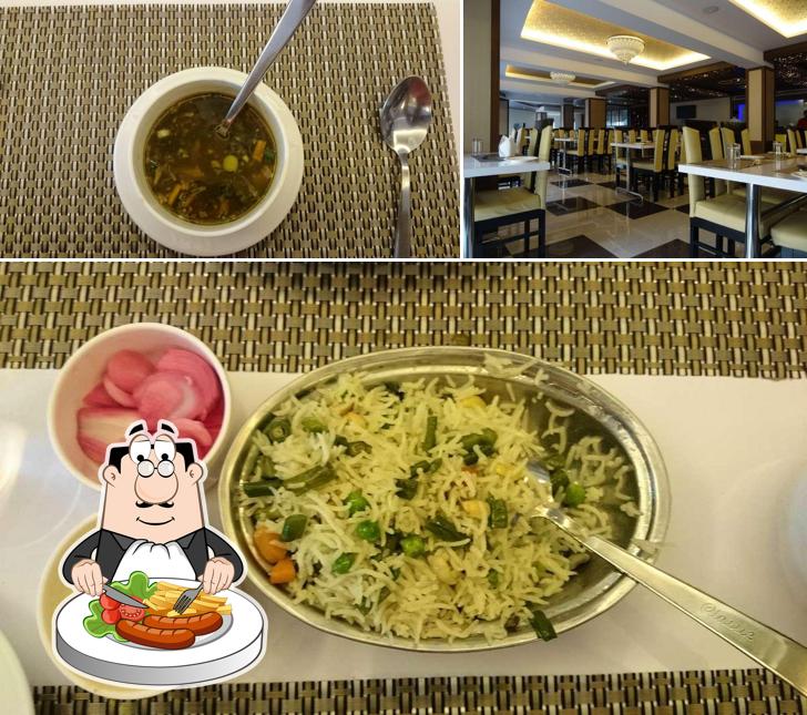This is the photo showing food and interior at DAWAT - Hotel Ganges Grand