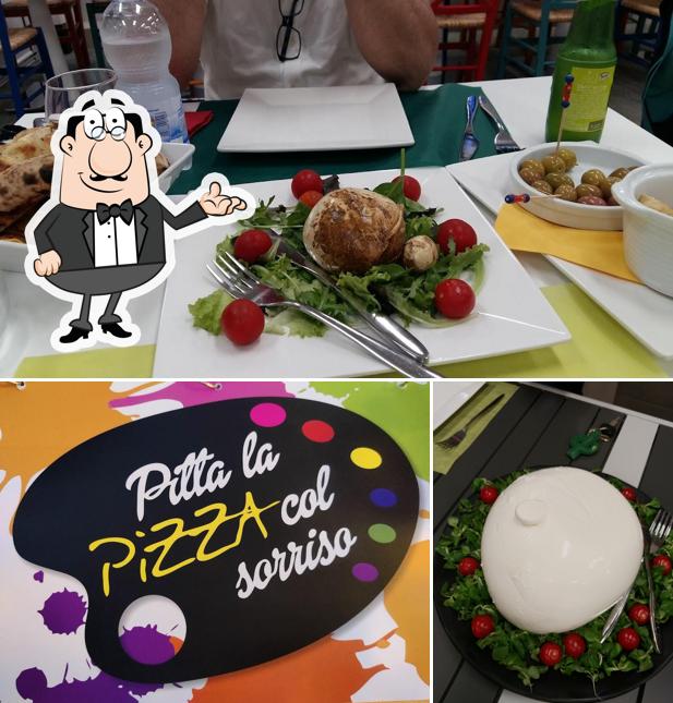 Siediti a un tavolo di Pizzeria PITTA LA PIZZA COL SORRISO FORNO A LEGNA GIOVINAZZO