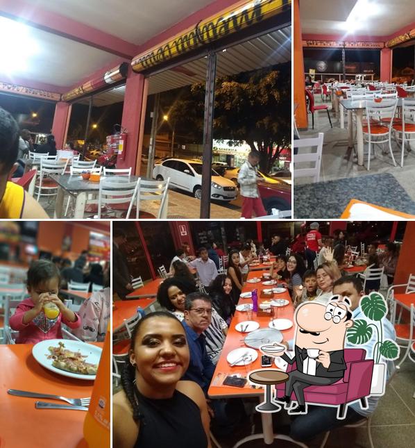 O interior do Pizzaria Donattela