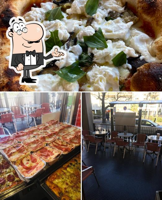Questa è la immagine che raffigura la interni e cibo di Pizzamania