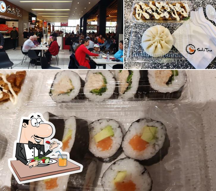 Take a look at the picture depicting food and interior at Sushi Time