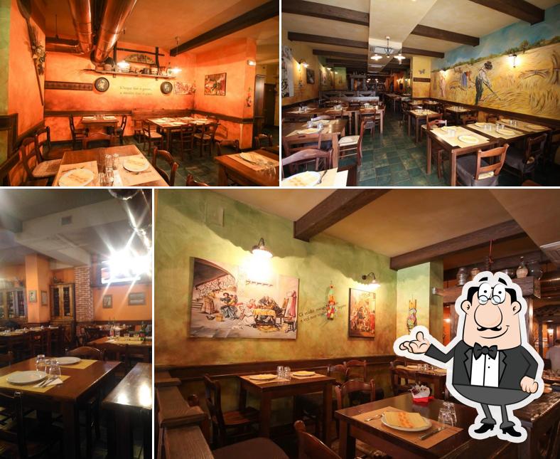 Dai un'occhiata agli interni di L'Osteria dei Quattro Gatti