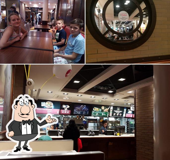 L’image de la intérieur et table à manger concernant McDonald's