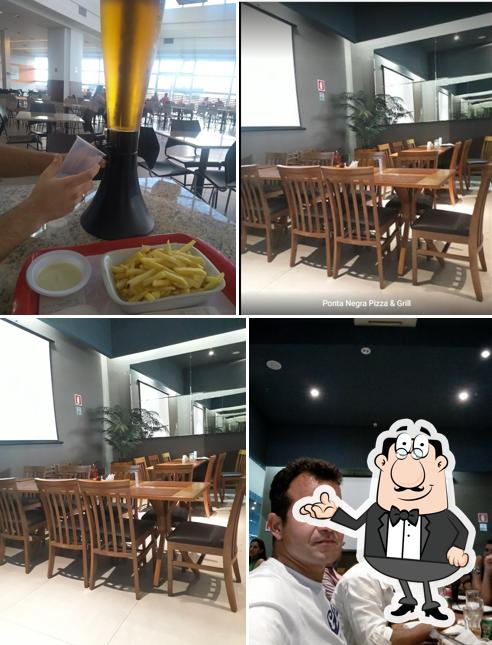 Sente em uma das mesas no Ponta Negra Pizza & Grill