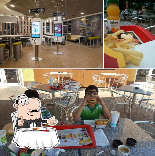 This is the photo depicting dining table and interior at McDonald's