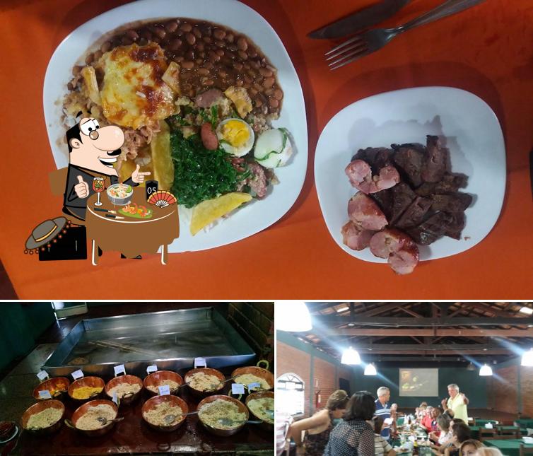 Entre diferentes coisas, comida e interior podem ser encontrados no Churrascaria Zé Dias