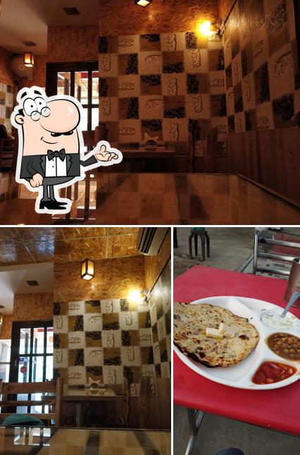 This is the picture depicting interior and food at Kulcha Cafe