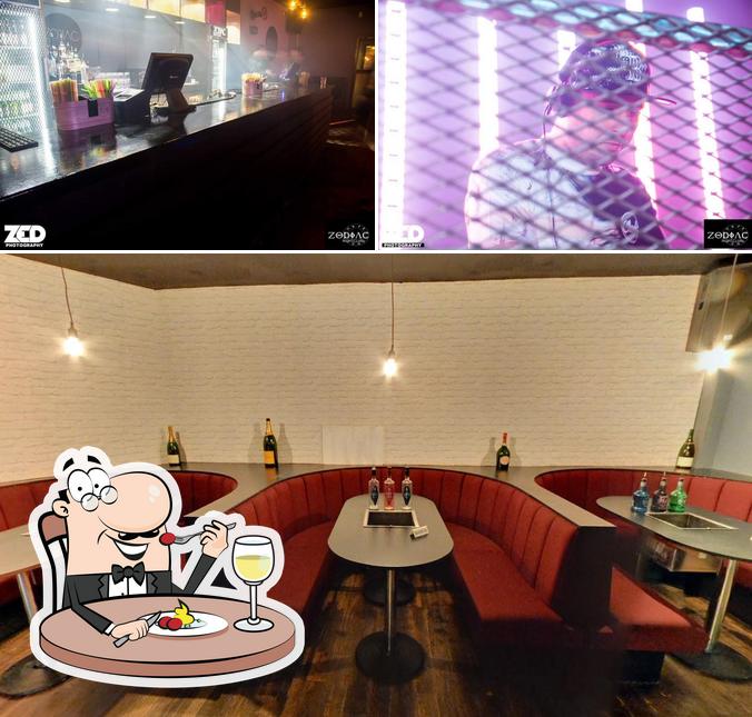 The picture of Zodiac Nightclub’s food and interior