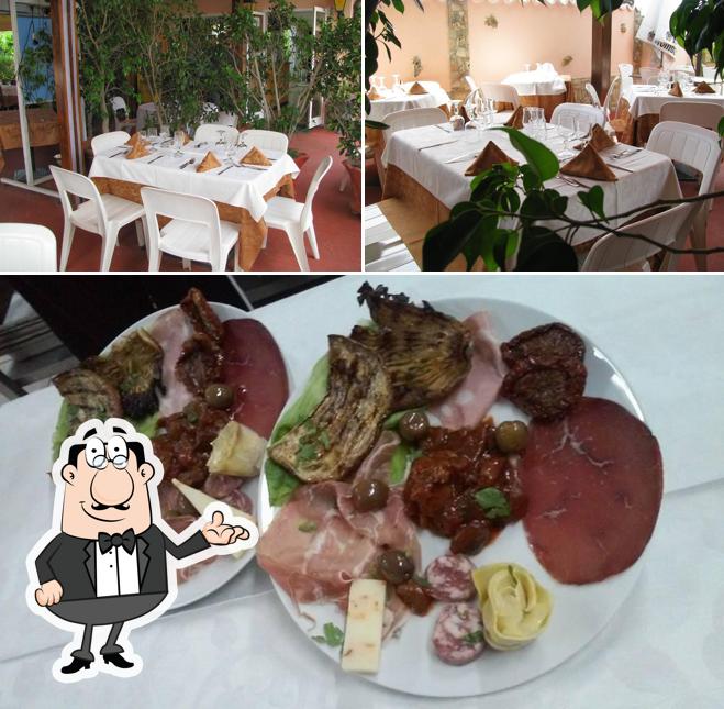 Questa è la immagine che raffigura la interni e cibo di ALLA ZAGARA