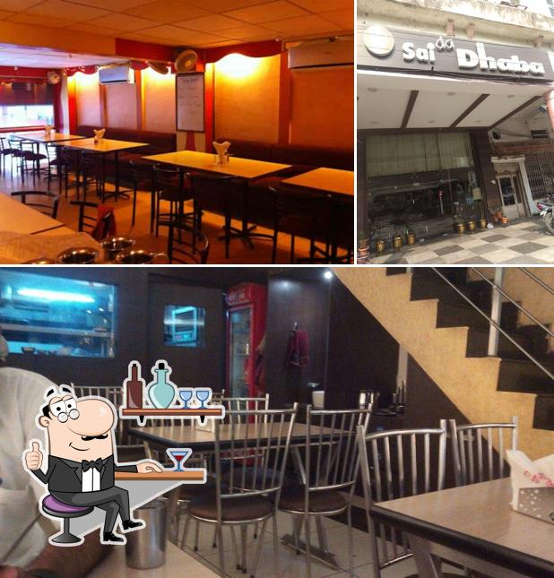 Check out the image displaying interior and exterior at Sai dhaba