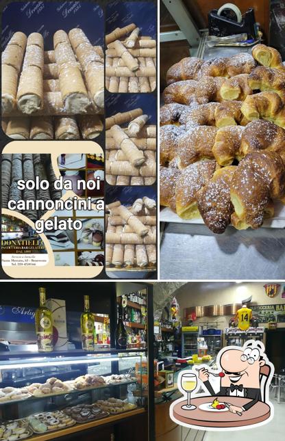 Tra le varie cose da Gelateria pasticceria bar donatiello si possono trovare la cibo e birra