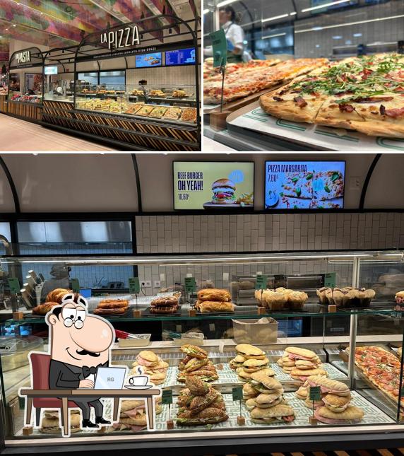 Las fotografías de interior y pizza en La Boutique Trattoria Viajera