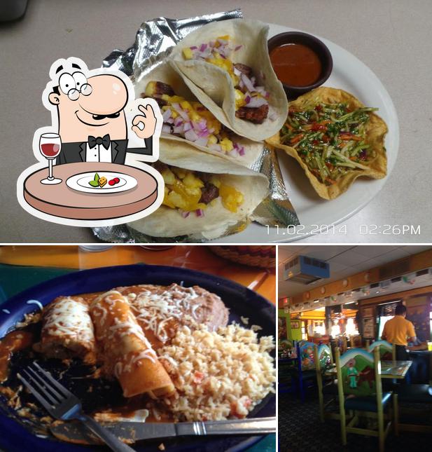 Take a look at the image showing food and interior at Los Arrieros