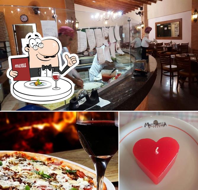 Entre diferentes coisas, comida e interior podem ser encontrados a Mozzarella Pizzaria