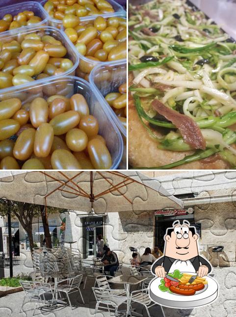 Dai un’occhiata alla immagine che mostra la cibo e interni di Alberto's Pizza Civitavecchia