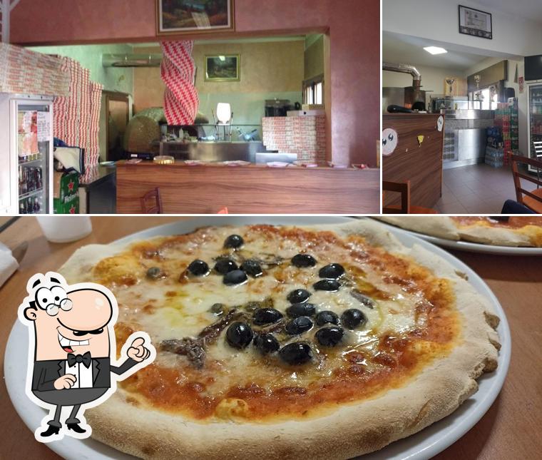 La foto della interni e pizza di Pizzeria da Adriano