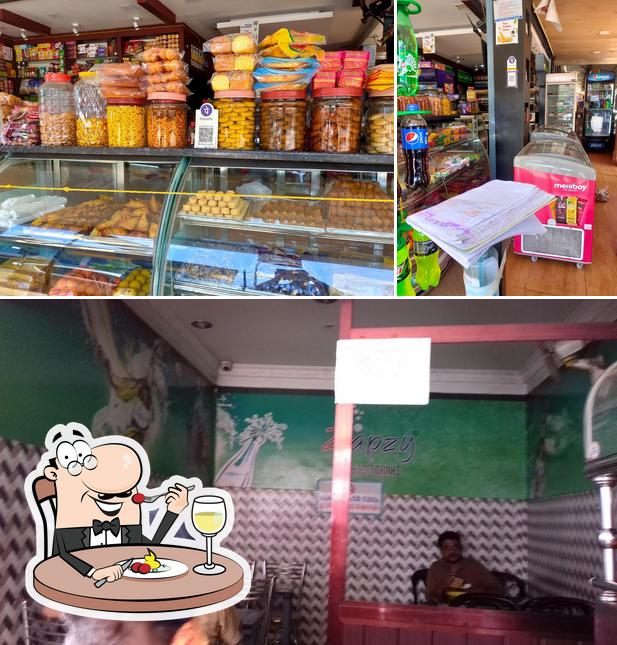 This is the image displaying food and interior at SWEET LAND BAKERY Manassey