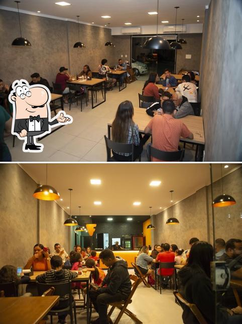 O interior do Fratello Pizzaria