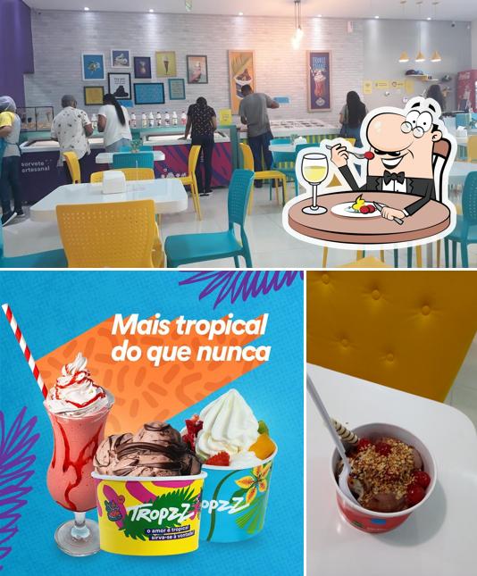 Entre diferentes coisas, comida e interior podem ser encontrados no Tropzz - Patrocínio