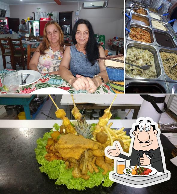 Entre diferentes coisas, comida e interior podem ser encontrados no Restaurante Aquário