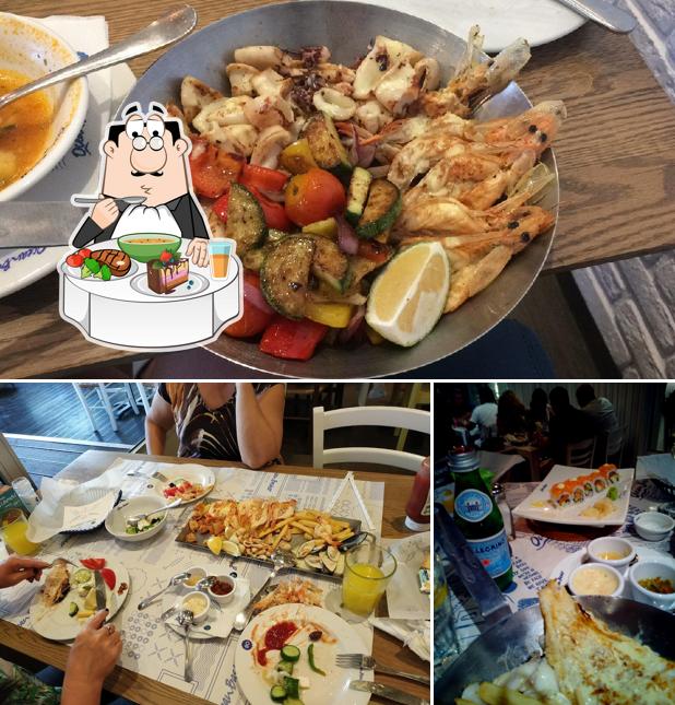 Parmi les différentes choses de la table à manger et la nourriture, une personne peut trouver sur Ocean Basket Paphos Coral Bay