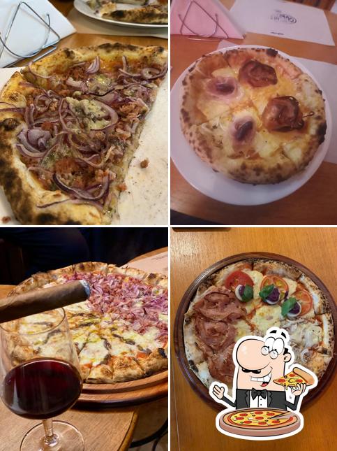 Consiga pizza no Cuevas Pizzaria