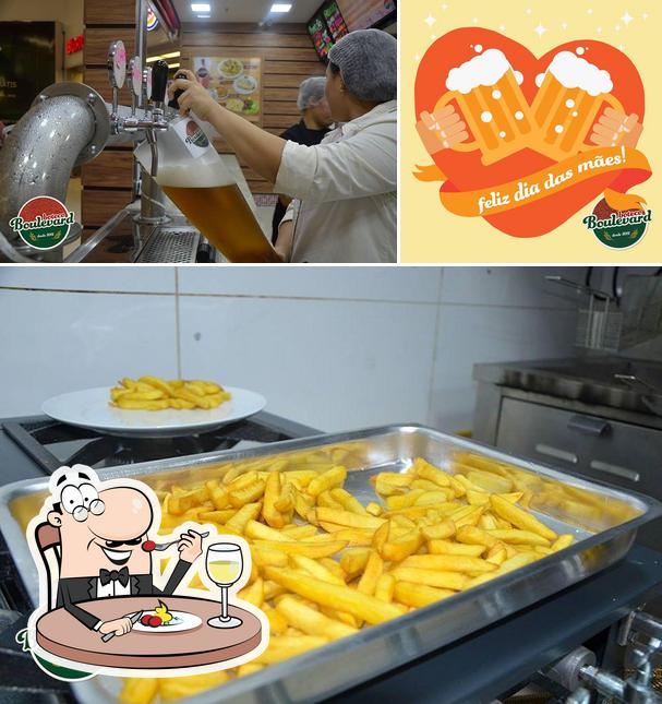 A ilustração a Boteco Boulevard Paulinia’s comida e exterior