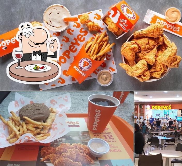 Confira a foto ilustrando comida e interior no Popeyes Louisiana Kitchen