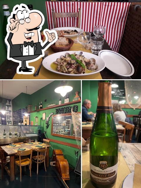 Siediti a un tavolo di Trattoria Fauro Roma