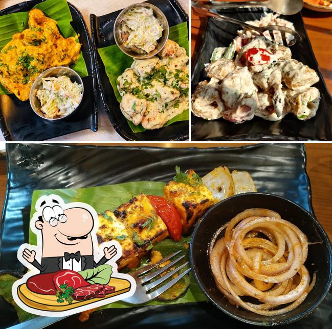 Meat meals are served at Sandoz Restaurant - Lajpat Nagar