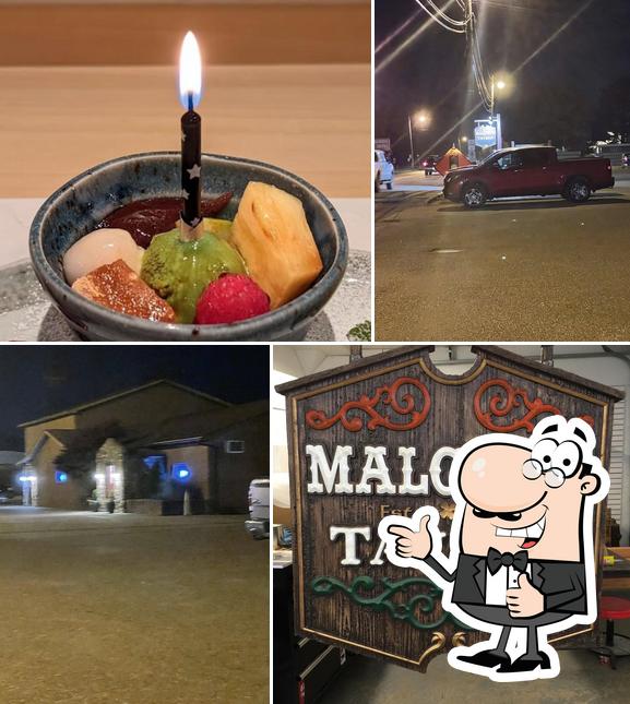 Look at the picture of Malcuit's Tavern