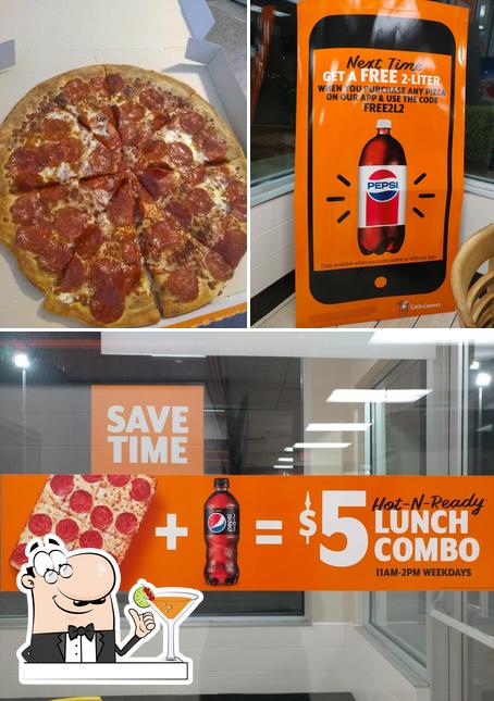 This is the picture showing drink and pizza at Little Caesars Pizza