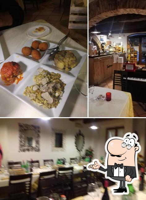 Dai un'occhiata agli interni di Taverna Degli Archi