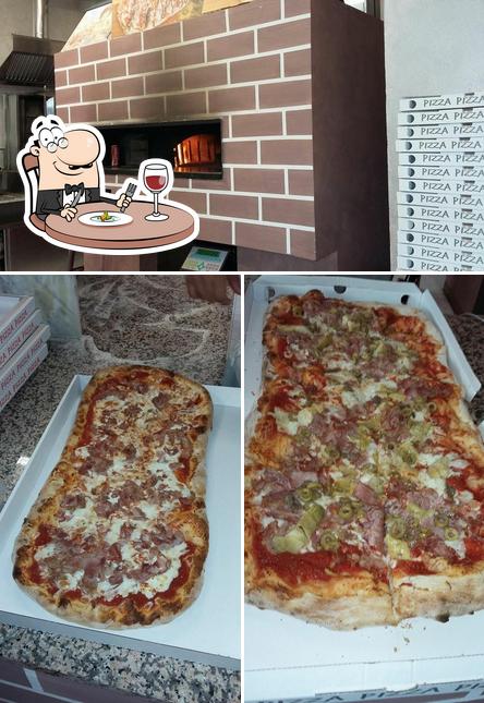 Tra le varie cose da Pizzeria el mago 33 si possono trovare la cibo e interni