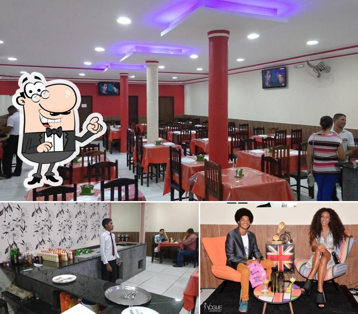 O interior do Emilly Pizzaria e Churrascaria