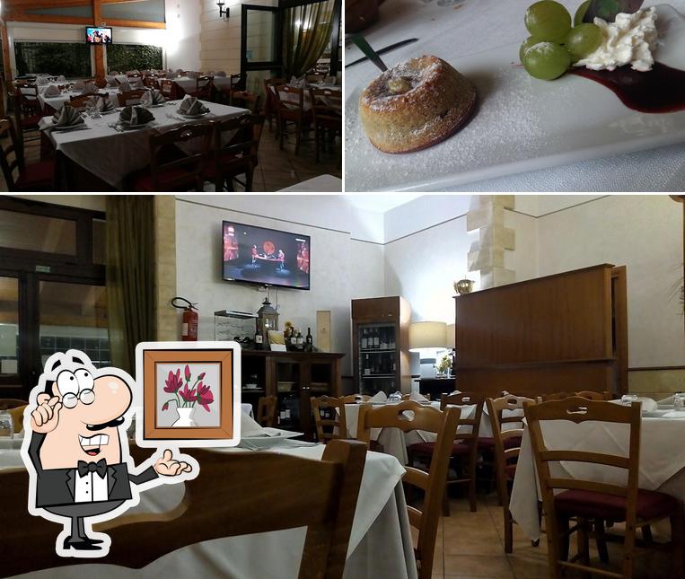 La immagine della interni e cibo di Ristorante Il Quadrifoglio