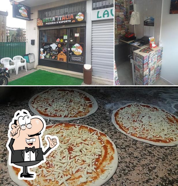 La foto di interni e pizza da Bella Italia