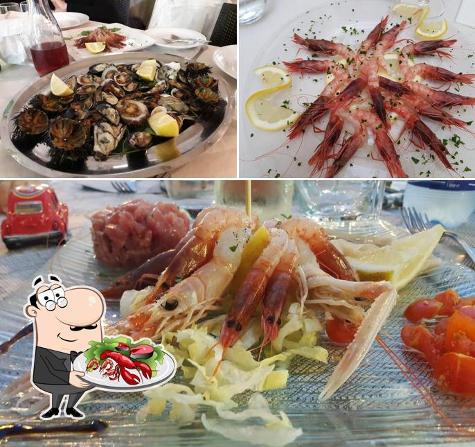 Ordina la cucina di mare a Trattoria “Mamma Cia”