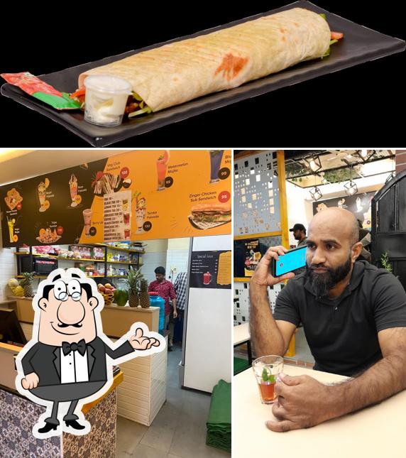 This is the image depicting interior and food at EAT N DRINK