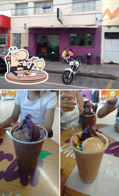 Entre diferentes coisas, comida e exterior podem ser encontrados no Açaí , Sorveteria & Lanchonete Universitário- Alfenas