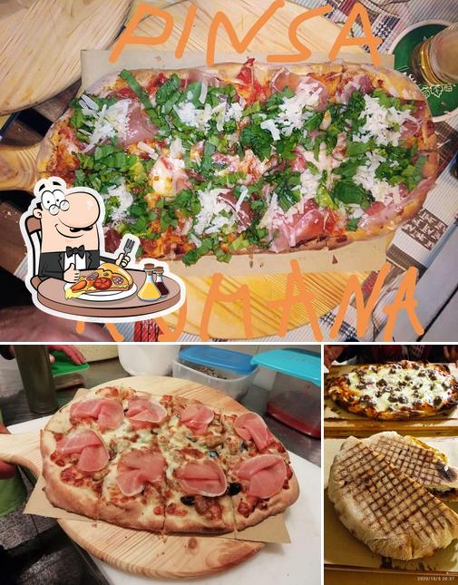 Scegli una pizza a Ristorante Cunzatu e Mangiato