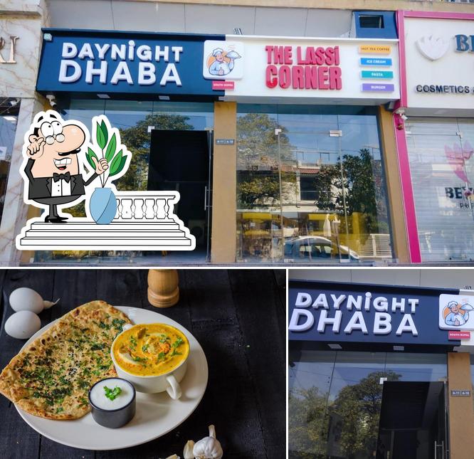 Take a look at the photo displaying exterior and pizza at Daynight dhaba