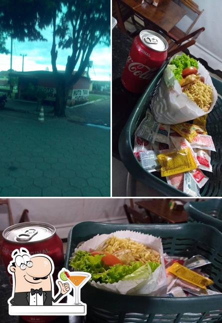 A imagem do Estação Lanches’s bebida e exterior
