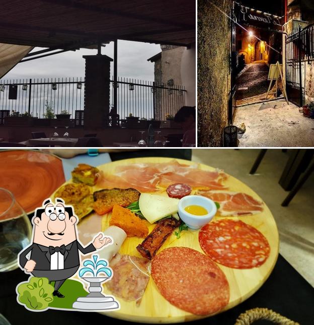 Guarda la immagine che mostra la esterno e cibo di Ristorante La Taverna