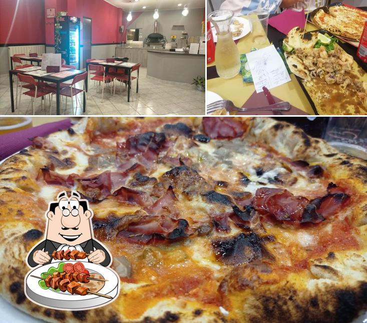 Tra le varie cose da Acore Acore - Pizzeria Napoletana Fritto Misto si possono trovare la cibo e interni