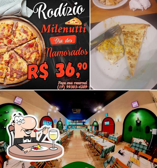 Esta é a foto mostrando comida e interior no MILENUTTI PIZZARIA