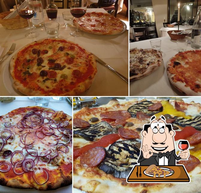 A Ristorante Pizzeria Sotto Sotto, puoi ordinare una bella pizza