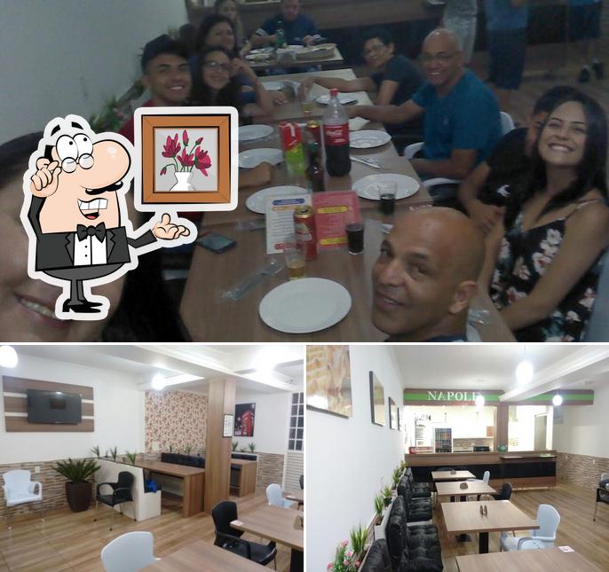 Esta é a ilustração ilustrando interior e mesa de jantar a Napole Pizzaria