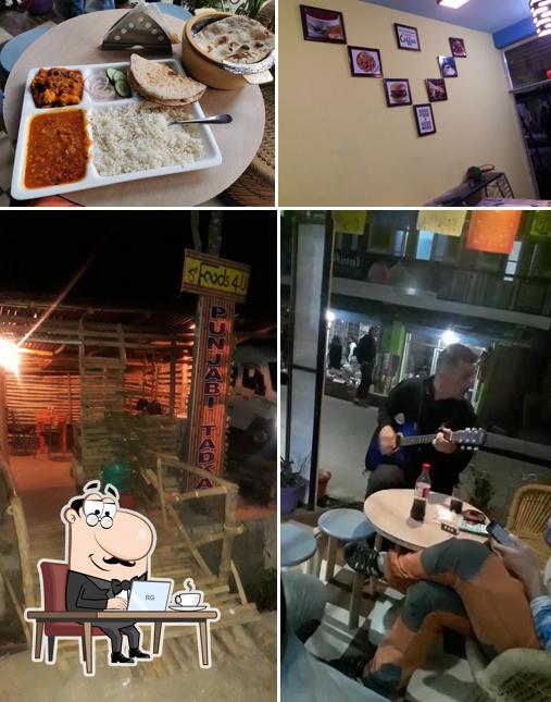 Take a seat at one of the tables at Foods 4 U