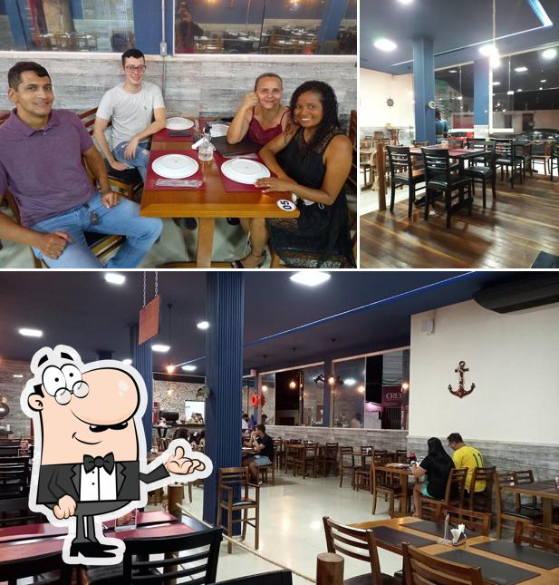 Veja imagens do interior do Porto Pirata Pizzaria